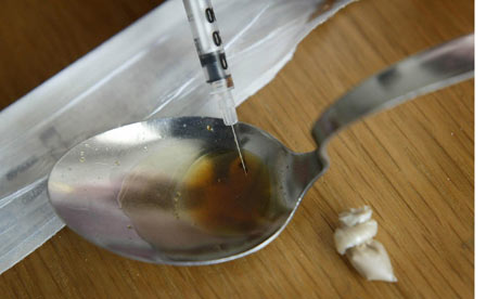 Heroin being prepared for injection Heroin being prepared for injection